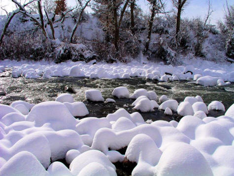 Eagle River and snow covered boulders